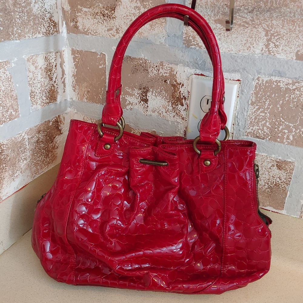 Donald J Pliner patent italian leather purse